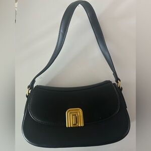 Elegant Black Shoulder Bag with Gold Accent